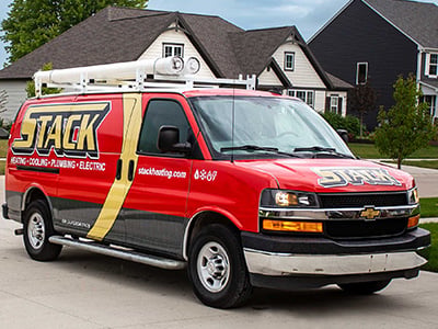 Red Stack service van parked in front of a Northeast Ohio home